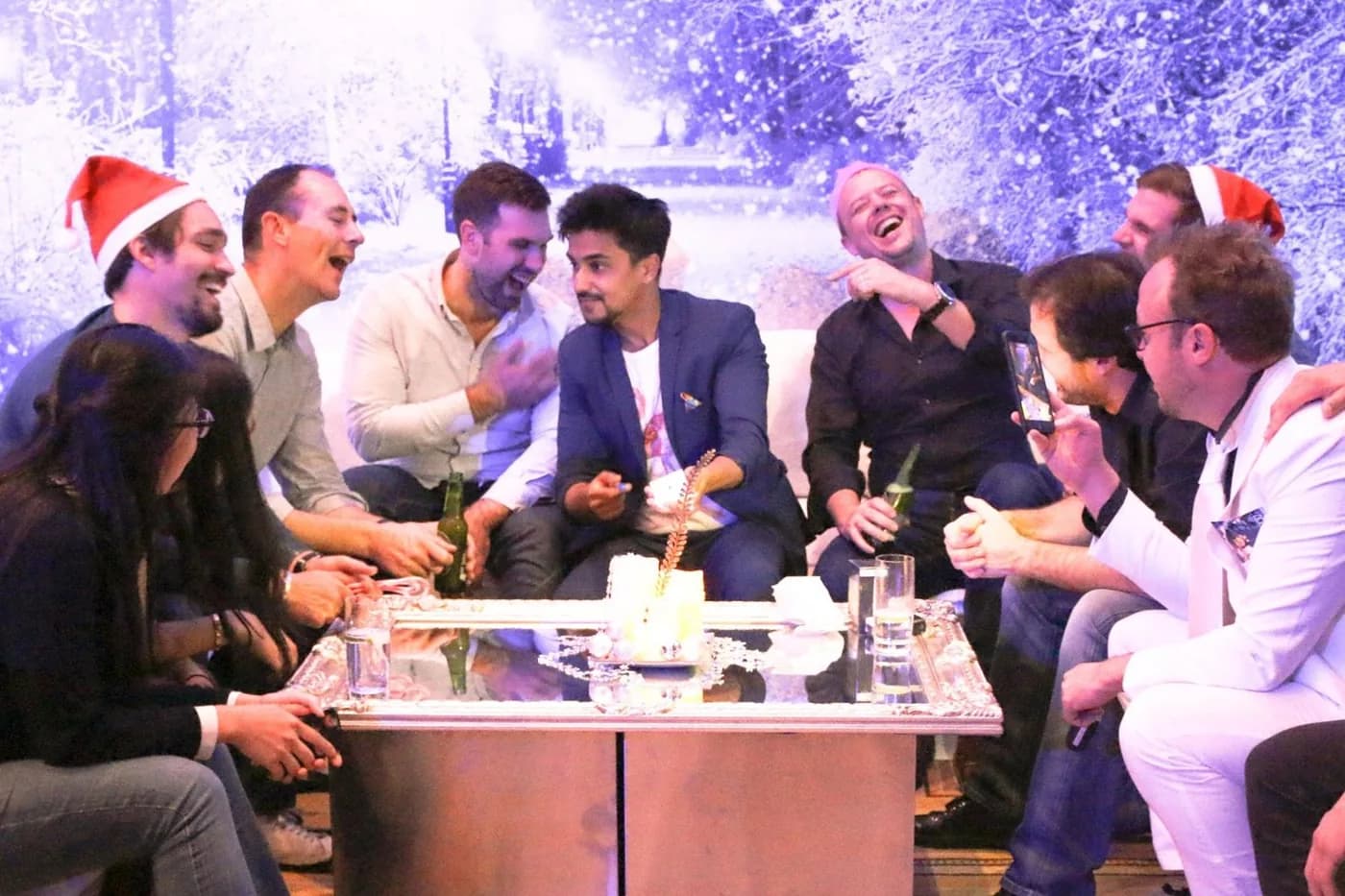Guests gather around Nabeel for a close-up performance.