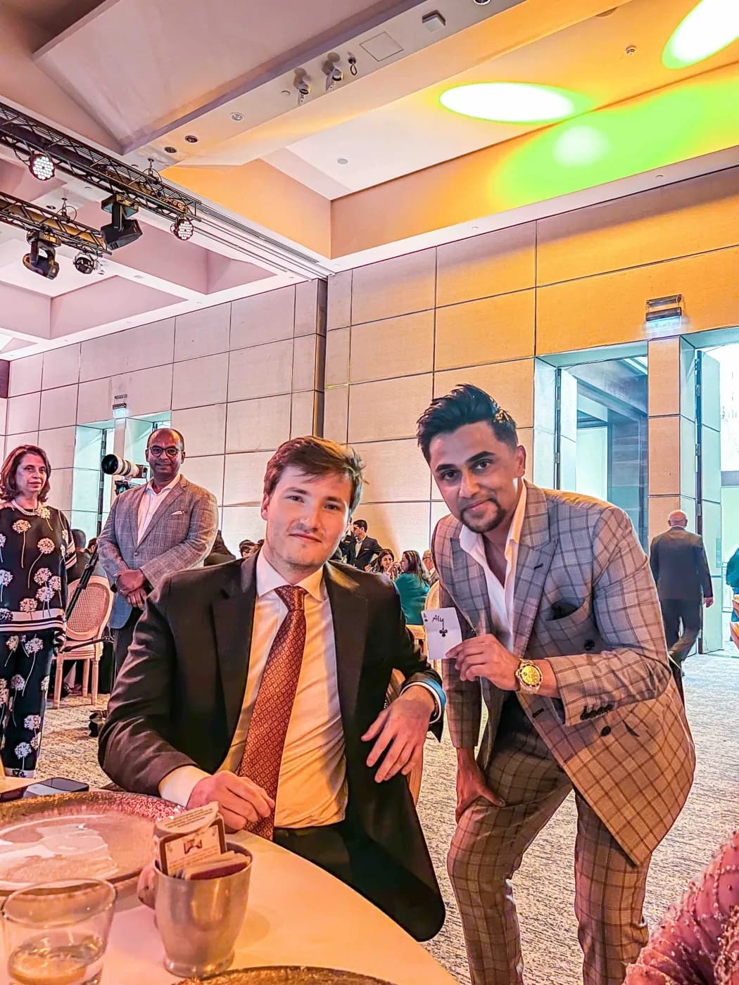 Nabeel and a guest at a dinner event.